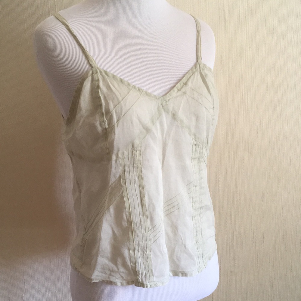 Sheer cotton camisole. Buttons down the back.